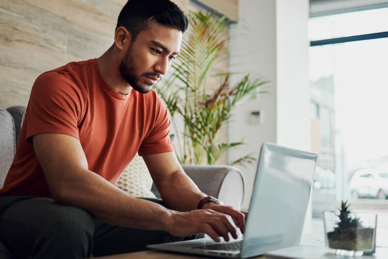 man using laptop computer