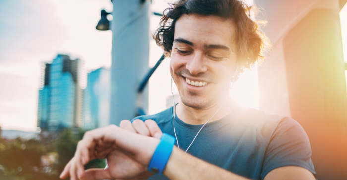 man looking at watch