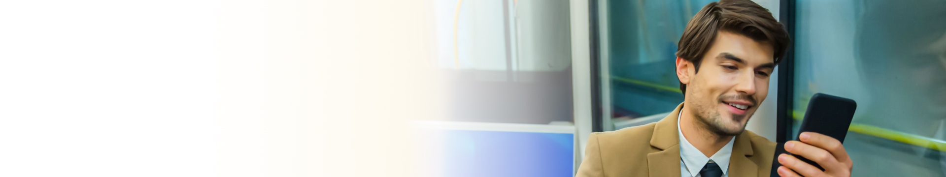 Men smiling looking at mobile