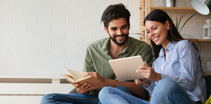 couple checking real estate prices