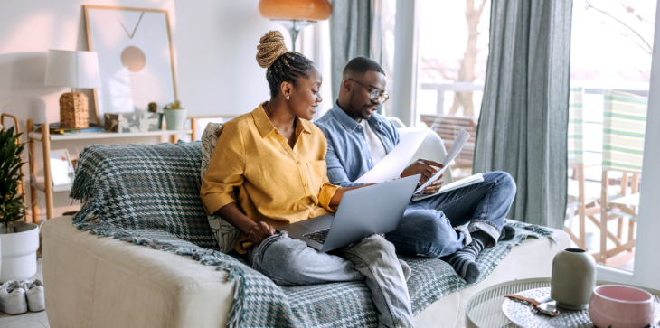 couple preparing their taxes for their home